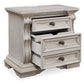Bruchandi - Antique White - Three Drawer Night Stand
