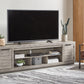 Naydell - Gray - Xl TV Stand W/Fireplace Option