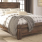 Trinell - Panel Bedroom Set