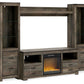 Trinell - 4-Piece Entertainment Center With 63" TV Stand And Glass/Stone Fireplace Insert - Brown