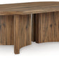 Austanny - Warm Brown - Oval Cocktail Table