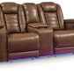 Gruaro - Power Reclining Loveseat With Console / Adjustable Headrest - Amber