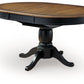 Clorazi - Oval Dining Room Butterfly Extension Table - Black / Brown - Fraser Furniture & Mattresses