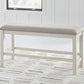 Robbinsdale - Antique White - Dbl Counter Height Upholstered Dining Bench