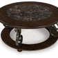 Frallyn - Round Cocktail Table - Dark Brown