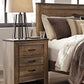 Trinell - Panel Bedroom Set