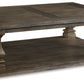 Johnelle - Rectangular Cocktail Table - Gray