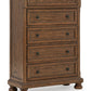 Zackaryn - Five Drawer Chest - Warm Brown
