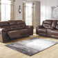 Stoneland - Chocolate - Reclining Sofa - Faux Leather