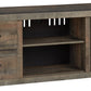 Trinell - TV Stand w/Fireplace Option - 60" x 14.8" x 24.33" - Brown Dark
