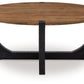 Hanneforth - Round Cocktail Table - Brown