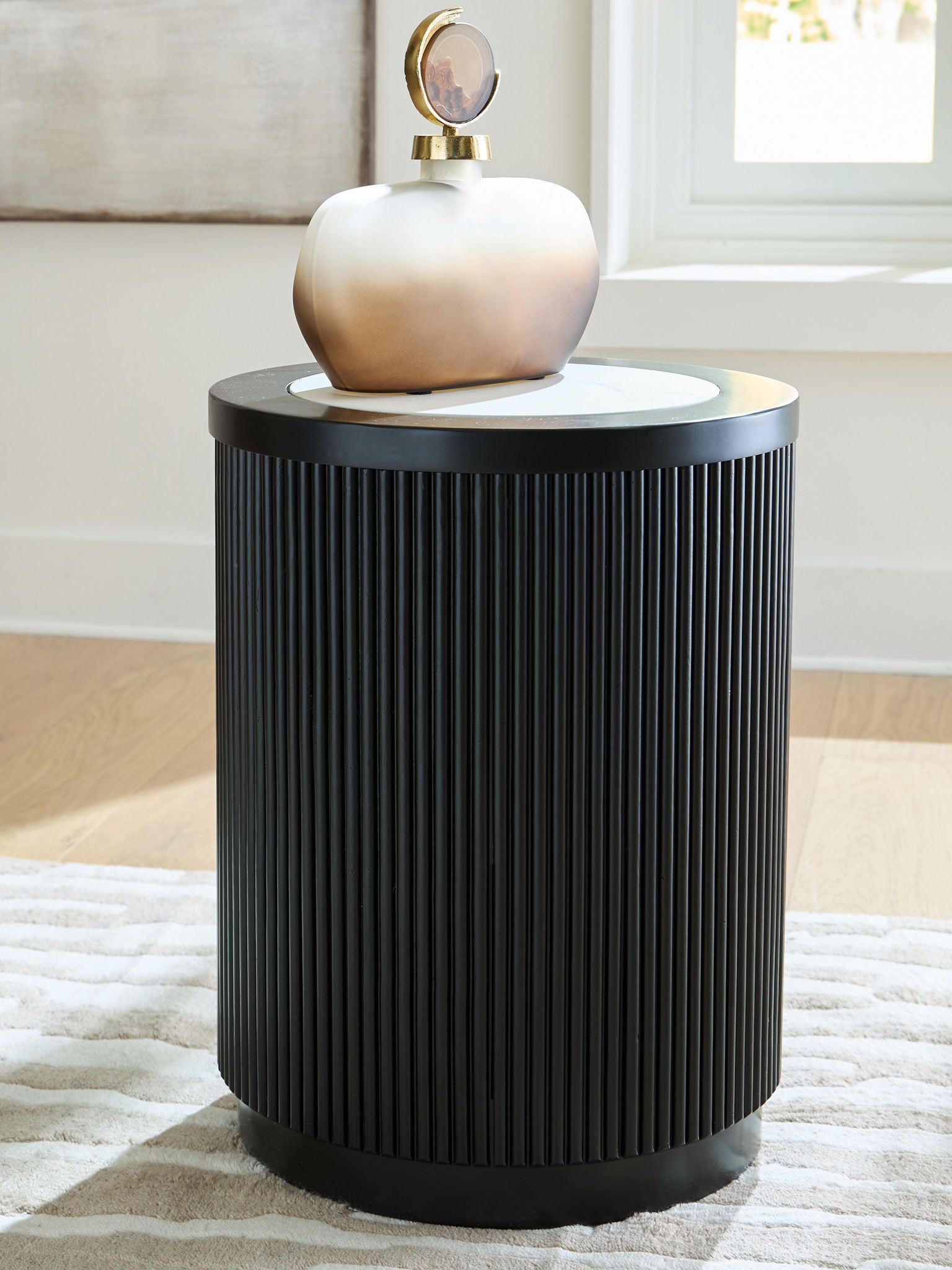 Grayman - Round Table - Fraser Furniture & Mattresses