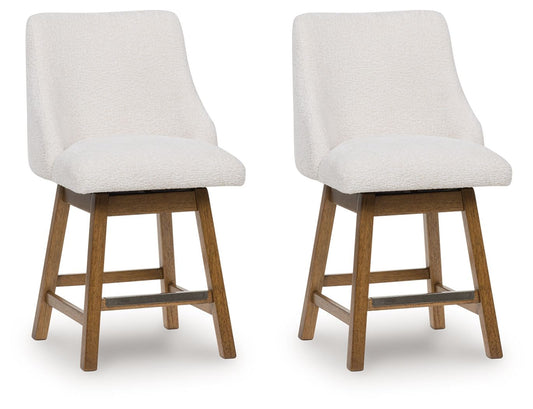 Cabalynn - Oatmeal / Light Brown - Upholstered Swivel Barstool (Set of 2)