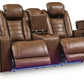 Gruaro - Power Reclining Loveseat With Console / Adjustable Headrest - Amber