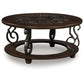 Frallyn - Round Cocktail Table - Dark Brown